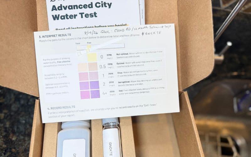 Cloud RO 12-month chlorine test showing approximately 0 ppm beside the Tap Score color chart, August 2026
